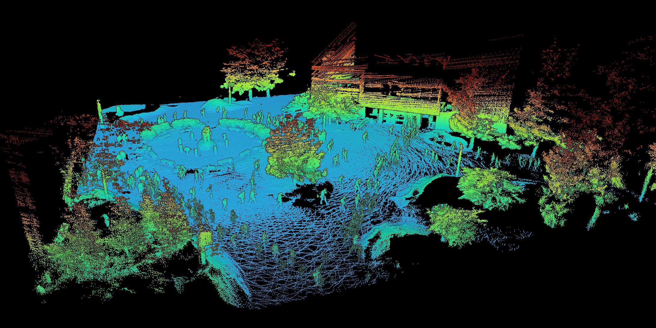Point cloud looking across Husky Plaza, past the statue and people, toward the building facade